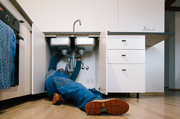 Professional Emergency Plumber technician working in Russiaville, IN